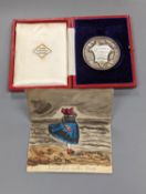A silver Guildhall School elocution medal, 1935, and a humorous watercolour