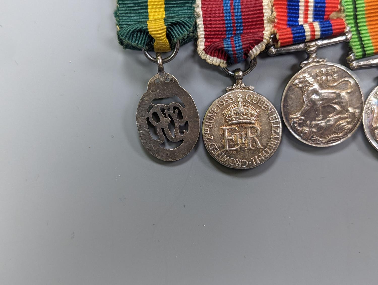 A WWII medal group of six, with miniatures, and a royal commemorative medal, 1937 - Image 15 of 15