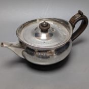 A George III engraved silver teapot, with crest, Robert & Samuel Hennell, London, 1802,gross 18.