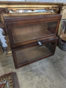 A Globe Wernicke mahogany two section bookcase, width 85cm, depth 36cm, height 80cm (wormed)