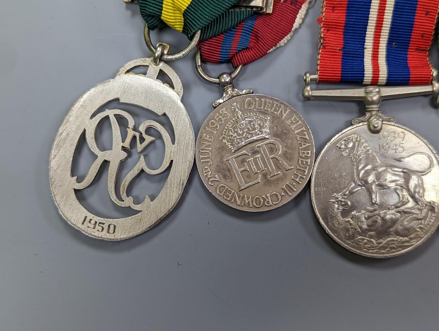 A WWII medal group of six, with miniatures, and a royal commemorative medal, 1937 - Image 9 of 15