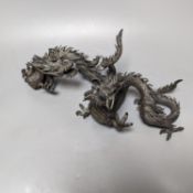 A pair of early 20th century Japanese bronze figures of dragons 22cm