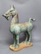 A large Chinese bronze figure of a horse, Han style 58cm