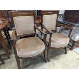 A pair of French Empire style mahogany gilt metal mounted elbow chairs, width 54cm, depth 50cm,
