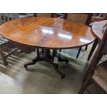 A Victorian figured walnut oval Sutherland table, width 100cm, length 118cm extended, height 72cm