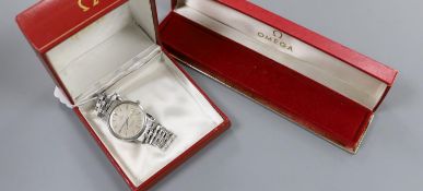A gentleman's stainless steel Omega Seamaster quartz wrist watch, on Omega bracelet, with two