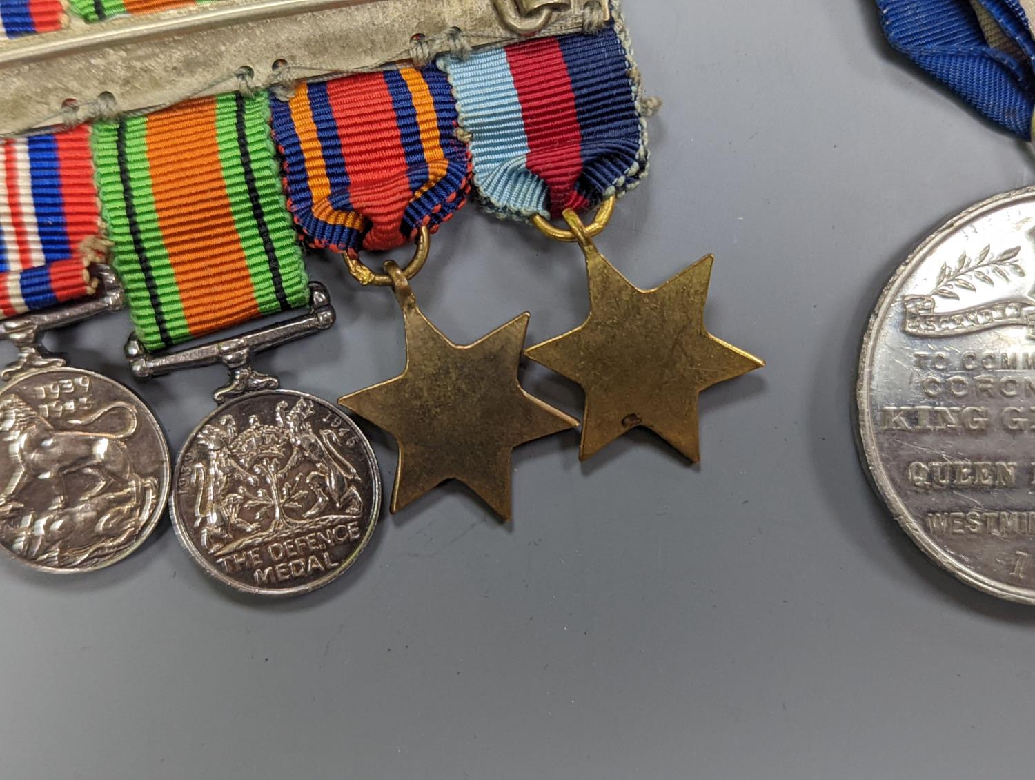 A WWII medal group of six, with miniatures, and a royal commemorative medal, 1937 - Image 13 of 15