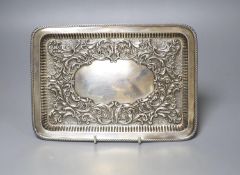 A late Victorian repousse silver rectangular dressing table tray, Joseph Gloster, Birmingham,