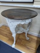 A Victorian white painted cast iron Britannia pub table, diameter 62cm, height 77cm