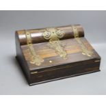 A coromandel stationery box with brass mounts, 32 cms wide.