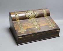 A coromandel stationery box with brass mounts, 32 cms wide.