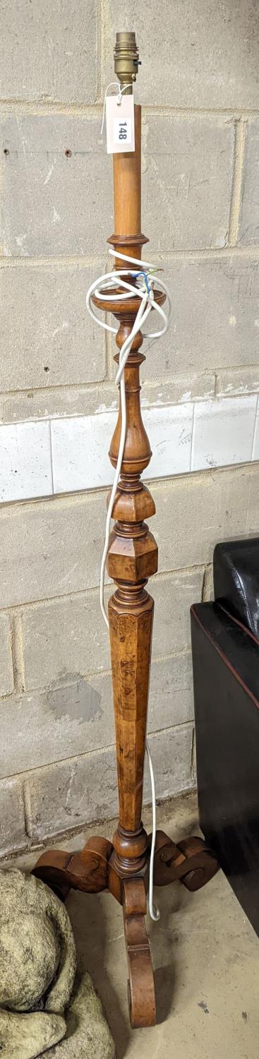 A 1920's Italian style burr walnut veneered tripod standard lamp, height 145cm