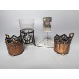 A pair of early WMF copper cup holders, pewter cup holder and a WMF matchbox holder