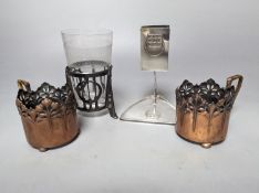A pair of early WMF copper cup holders, pewter cup holder and a WMF matchbox holder