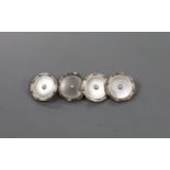 A cased pair of 18ct, 9ct, mother of pear and seed pearl set circular cufflinks, 13mm, gross