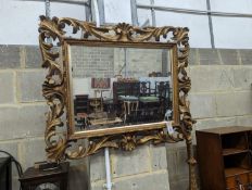 A 19th century Florentine style carved giltwood rectangular wall mirror, width 82cm, height 68cm