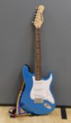 A Huntingdon electric guitar, stand not included, guitar 102 cms high.