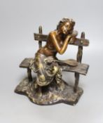 A bronze female, seated with lute, 27cm.