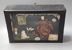 A Diorama, interior scene of Victorian dolls and objects, 38 cm wide