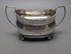 A George III engraved silver two handled sugar bowl, maker ?D, London, 1812, width 19cm,6.5oz.