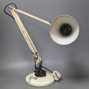 A cream anglepoise lamp