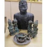 A group of Nigerian cast metal figures, bangles and a dish, tallest 36 cms high.