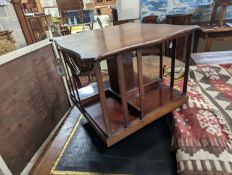 A late Victorian table top revolving bookcase, width 37cm, height 32cm