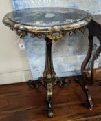 A Victorian mother of pearl inlaid gilt decorated circular tilt top papier mache tripod wine