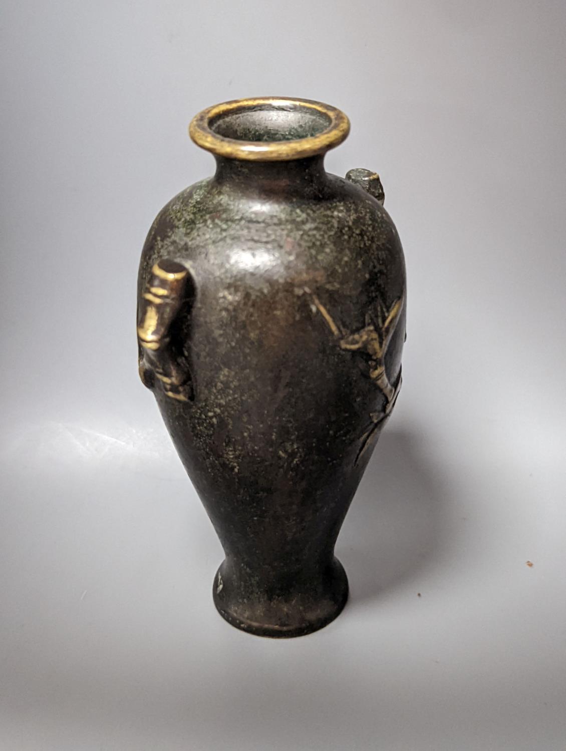 A Chinese bronze vase, 12cm., and an Islamic pierced brass lamp - Image 5 of 6