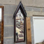 A Victorian painted Gothic style arched wall mirror, height 84cm