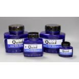 Four large display ceramic Royal Blue Parker Quink ink bottles, largest 20 cms high.