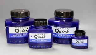 Four large display ceramic Royal Blue Parker Quink ink bottles, largest 20 cms high.