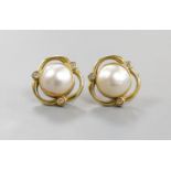 A pair of 750 yellow metal, mabe pearl and diamond chip set earrings, 16mm, gross weight 7 grams,