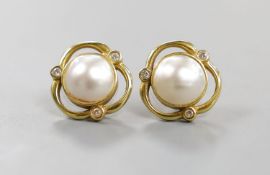 A pair of 750 yellow metal, mabe pearl and diamond chip set earrings, 16mm, gross weight 7 grams,