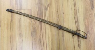 A Chinese sword, single edged blade 64cm, in etched brass scabbard
