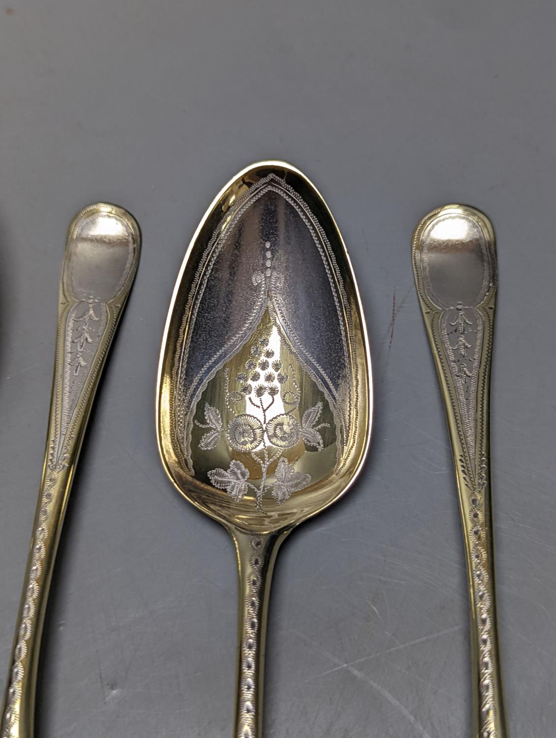 A set of 4 George III parcel gilt silver spoons, with engraved decoration, Thomas Northcote, London, - Image 2 of 3