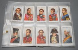 A large collection of pre and post war cigarette cards, in two albums, mounted in a plastic sheets