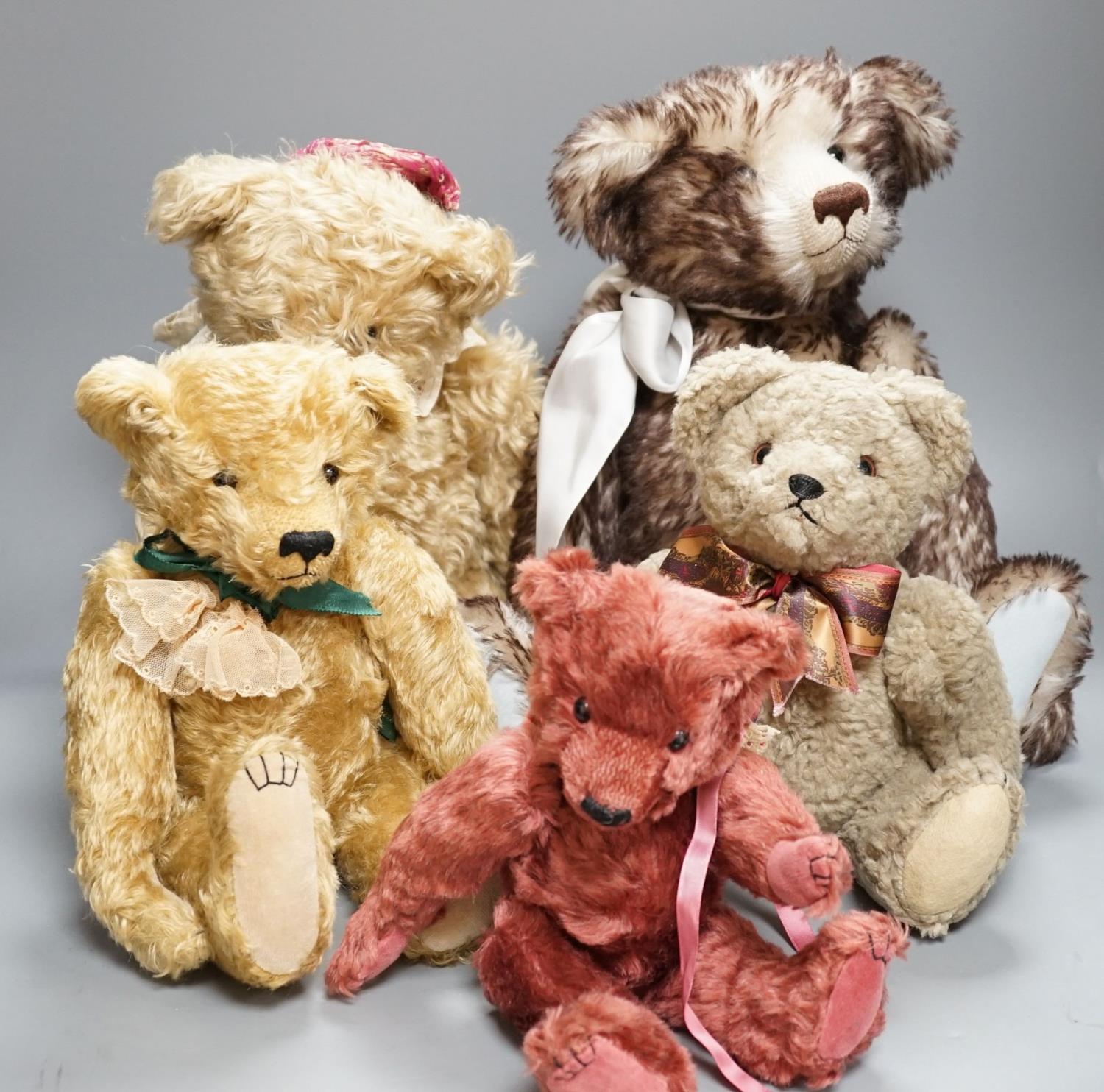 Four Pam Howells bears and one Clements bear
