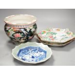 Three Japanese porcelain dishes and a jardiniere, 19 cms high.