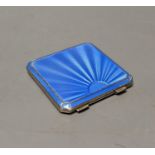 A 1930's At Deco Asprey & Co silver and blue guilloche enamel compact, 74mm.