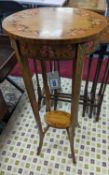 A small Sheraton style oval painted satinwood two tier plant stand, width 30cm, depth 25cm, height