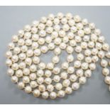 A long single strand baroque cultured pearl necklace, 128cm.