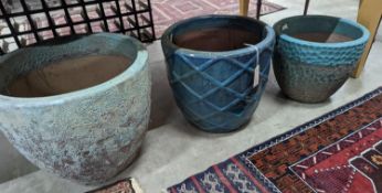 Three glazed earthenware garden planters, largest diameter 45cm