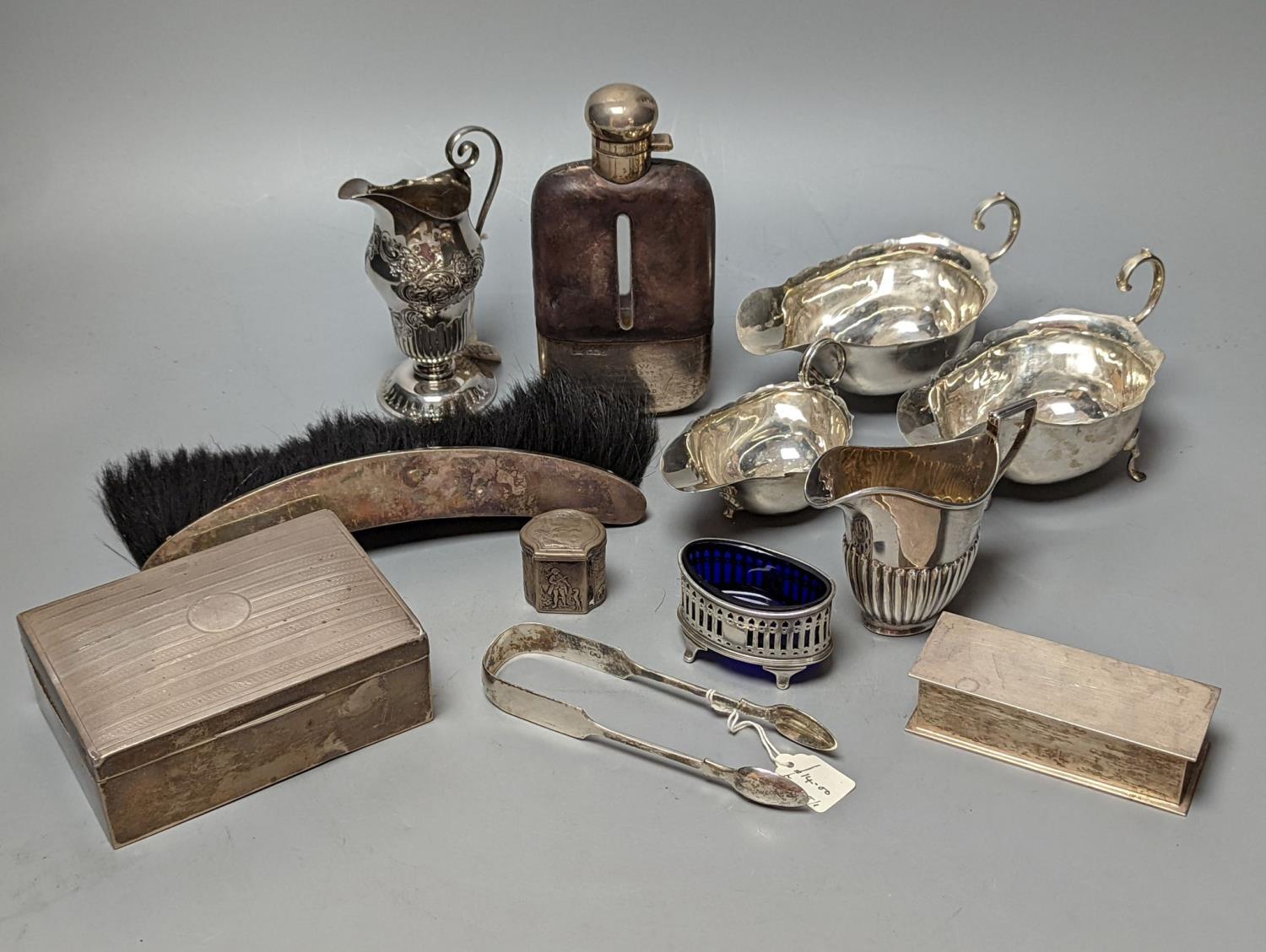 A group of assorted silver items including George V silver mounted hip flask(bruise), a pair of