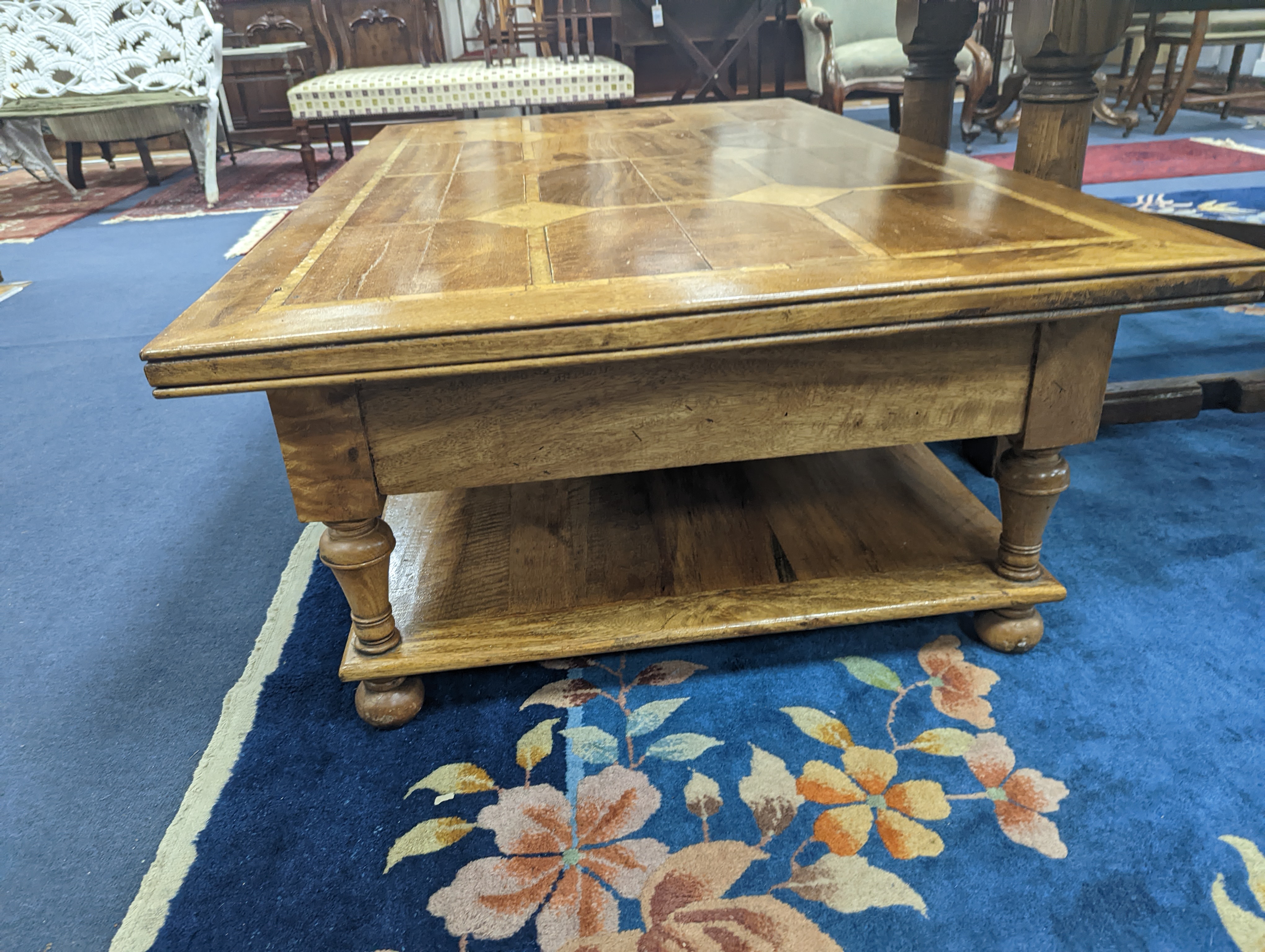 A hardwood and marble inset coffee table, length 130cm, depth 80cm, height 45cm - Image 5 of 7