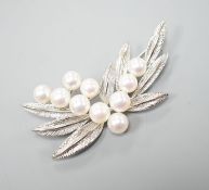 A Mikimoto cultured pearl cluster set metal spray brooch, 54mm.