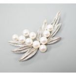 A Mikimoto cultured pearl cluster set metal spray brooch, 54mm.