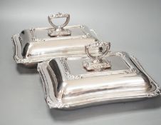 A pair of electroplate entree dishes and covers, 30cm