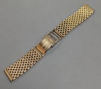 A 1960's 9ct gold watch strap, 15.5cm, with spare link,44.9 grams.