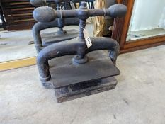 A Victorian cast iron book press, width 40cm, height 36cm